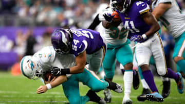 MINNEAPOLIS, MN - DECEMBER 16: Ryan Tannehill #17 of the Miami Dolphins is sacked by Eric Kendricks #54 of the Minnesota Vikings in the third quarter of the game at U.S. Bank Stadium on December 16, 2018 in Minneapolis, Minnesota. (Photo by Hannah Foslien/Getty Images)