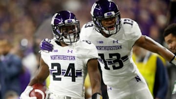 INDIANAPOLIS, INDIANA - DECEMBER 01: Montre Hartage #24 of the Northwestern Wildcats celebrates after catching an interception against the Ohio State Buckeyes in the second quarter at Lucas Oil Stadium on December 01, 2018 in Indianapolis, Indiana. (Photo by Joe Robbins/Getty Images)