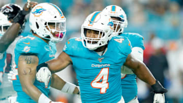 MIAMI, FLORIDA - AUGUST 08: Nate Orchard #4 of the Miami Dolphins reacts after a sack against the Atlanta Falcons during the first quarter of the preseason game at Hard Rock Stadium on August 08, 2019 in Miami, Florida. (Photo by Michael Reaves/Getty Images)