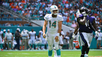 MIAMI, FLORIDA - SEPTEMBER 08: Ryan Fitzpatrick #14 of the Miami Dolphins looks on after being tackled in the second quarter against the Baltimore Ravens at Hard Rock Stadium on September 08, 2019 in Miami, Florida. (Photo by Mark Brown/Getty Images)