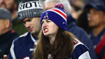 FOXBOROUGH, MASSACHUSETTS - JANUARY 04: A fan of the New England Patriots reacts as they take on the Tennessee Titans in the AFC Wild Card Playoff game at Gillette Stadium on January 04, 2020 in Foxborough, Massachusetts. (Photo by Adam Glanzman/Getty Images)