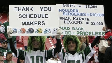 New York Jets fans hold up a sign thatnking the schedule makers during their 31 to 24 victory over the Detroit Liopns on October 22, 2006 at Giants Stadium in East Rutherford, New Jersey. (Photo by Ralph Waclawicz/NFLPhotoLibrary)