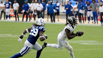 JACKSONVILLE, FLORIDA - SEPTEMBER 13: Laviska Shenault Jr. #10 of the Jacksonville Jaguars runs past Malik Hooker #29 of the Indianapolis Colts for a touchdown during the game at TIAA Bank Field on September 13, 2020 in Jacksonville, Florida. (Photo by Sam Greenwood/Getty Images)