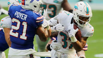 MIAMI GARDENS, FLORIDA - SEPTEMBER 20: Myles Gaskin #37 of the Miami Dolphins runs with the ball against the Buffalo Bills during the fourth quarter at Hard Rock Stadium on September 20, 2020 in Miami Gardens, Florida. (Photo by Michael Reaves/Getty Images)