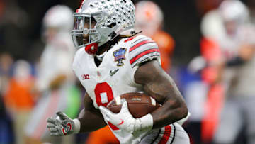 NEW ORLEANS, LOUISIANA - JANUARY 01: Trey Sermon #8 of the Ohio State Buckeyes carries the ball against the Clemson Tigers in the second half during the College Football Playoff semifinal game at the Allstate Sugar Bowl at Mercedes-Benz Superdome on January 01, 2021 in New Orleans, Louisiana. (Photo by Kevin C. Cox/Getty Images)