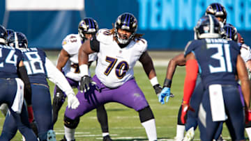 NASHVILLE, TENNESSEE - JANUARY 10: Guard D.J. Fluker #70 of the Baltimore Ravens drops back to block during their AFC Wild Card Playoff game against the Tennessee Titans at Nissan Stadium on January 10, 2021 in Nashville, Tennessee. The Ravens defeated the Titans 20-13. (Photo by Wesley Hitt/Getty Images)