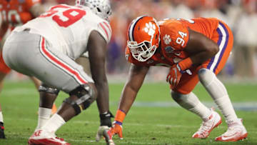 GLENDALE, AZ - DECEMBER 31: Defensive tackle Carlos Watkins #94 (R) of the Clemson Tigers lines up against offensive lineman Isaiah Prince #59 of the Ohio State Buckeyes during the Playstation Fiesta Bowl at University of Phoenix Stadium on December 31, 2016 in Glendale, Arizona. The Tigers defeated the Buckeyes 31-0. (Photo by Christian Petersen/Getty Images)