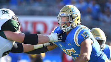 PASADENA, CA - SEPTEMBER 09: Jaelan Phillips #15 of the UCLA Bruins looks to get by a Hawaii Warriors lineman in the game at the Rose Bowl on September 9, 2017 in Pasadena, California. (Photo by Jayne Kamin-Oncea/Getty Images)