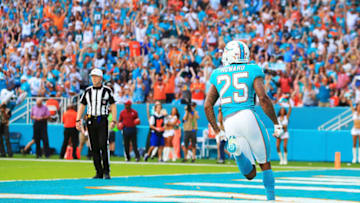 MIAMI GARDENS, FL - DECEMBER 03: Xavien Howard #25 of the Miami Dolphins after returning the interception for a touchdown in the second quarter against the Denver Broncos at the Hard Rock Stadium on December 3, 2017 in Miami Gardens, Florida. (Photo by Chris Trotman/Getty Images)