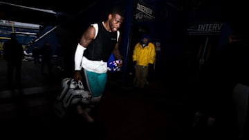 ORCHARD PARK, NY - DECEMBER 17: DeVante Parker #11 of the Miami Dolphins runs back to the locker room after a game against the Buffalo Bills on December 17, 2017 at New Era Field in Orchard Park, New York. (Photo by Bryan M. Bennett/Getty Images)