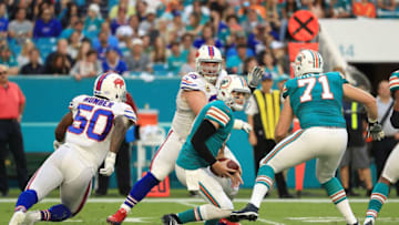 MIAMI GARDENS, FL - DECEMBER 31: David Fales #9 of the Miami Dolphins scrambling out the pocket during the second quarter against the Buffalo Bills at Hard Rock Stadium on December 31, 2017 in Miami Gardens, Florida. (Photo by Mike Ehrmann/Getty Images)
