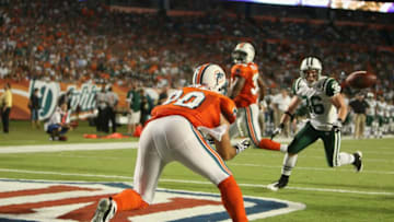 MIAMI - OCTOBER 12: Tight End Anthony Fasano #80 of the Miami Dolphins catches a touchdownl against the New York Jets at Land Shark Stadium on October 12, 2009 in Miami, Florida.The Dolphins wore their Orange jersey for the game. The Dolphins defeated the Jets 31-27. (Photo by Al Pereira/Getty Images)