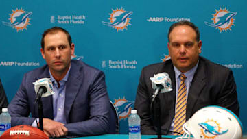 DAVIE, FL - APRIL 29: Head coach Adam Gase and Executive Vice President, Football OperationsMike Tannenbaum of the Miami Dolphins talks to members of the press concerning first round draft pick Laremy Tunsil at their training faciility on April 29, 2016 in Davie, Florida. (Photo by Mike Ehrmann/Getty Images)