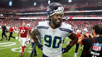 GLENDALE, ARIZONA - SEPTEMBER 29: Defensive end Jadeveon Clowney #90 of the Seattle Seahawks smiles following a 27-10 victory against the Arizona Cardinals during the the NFL football game at State Farm Stadium on September 29, 2019 in Glendale, Arizona. (Photo by Ralph Freso/Getty Images)
