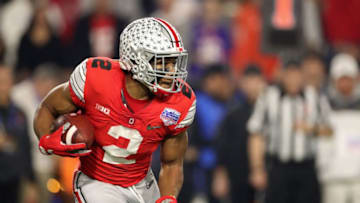 GLENDALE, ARIZONA - DECEMBER 28: Running back J.K. Dobbins #2 of the Ohio State Buckeyes rushes the football against the Clemson Tigers during the PlayStation Fiesta Bowl at State Farm Stadium on December 28, 2019 in Glendale, Arizona. The Tigers defeated the Buckeyes 29-23. (Photo by Christian Petersen/Getty Images)