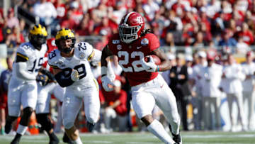 ORLANDO, FL - JANUARY 01: Najee Harris #22 of the Alabama Crimson Tide runs with the ball during the Vrbo Citrus Bowl against the Michigan Wolverines at Camping World Stadium on January 1, 2020 in Orlando, Florida. Alabama defeated Michigan 35-16. (Photo by Joe Robbins/Getty Images)