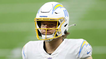 NEW ORLEANS, LOUISIANA - OCTOBER 12: Justin Herbert #10 of the Los Angeles Chargers warms up prior to their game against the New Orleans Saints during their NFL game at Mercedes-Benz Superdome on October 12, 2020 in New Orleans, Louisiana. (Photo by Chris Graythen/Getty Images)