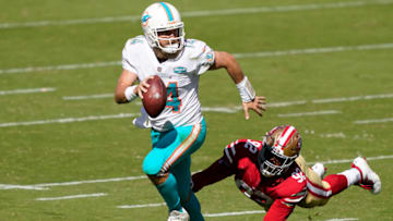 SANTA CLARA, CALIFORNIA - OCTOBER 11: Kerry Hyder Jr. #92 of the San Francisco 49ers pursues and sacks quarterback Ryan Fitzpatrick #14 of the Miami Dolphins during the first half of their NFL football game at Levi's Stadium on October 11, 2020 in Santa Clara, California. (Photo by Thearon W. Henderson/Getty Images)