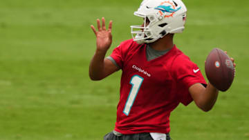 MIAMI, FLORIDA - JUNE 16: Quarterback Tua Tagovailoa #1 of the Miami Dolphins throws a pass in practice drills during Mandatory Minicamp at Baptist Health Training Facility at Nova Southern University on June 16, 2021 in Miami, Florida. (Photo by Mark Brown/Getty Images)