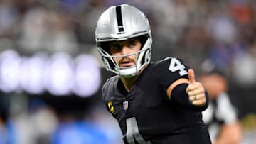 LAS VEGAS, NEVADA - JANUARY 09: Quarterback Derek Carr #4 of the Las Vegas Raiders lines up for a play against the Los Angeles Chargers during the first half of a game at Allegiant Stadium on January 09, 2022 in Las Vegas, Nevada. The Raiders defeated the Chargers 35-32 in overtime. (Photo by Chris Unger/Getty Images)