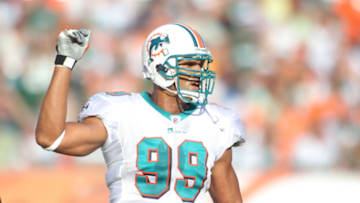 MIAMI GARDENS, FL - JANUARY 01: Defensive end Jason Taylor #99 of the Miami Dolphins celebrates against the New York Jets at Sun Life Stadium on January 1, 2012 in Miami Gardens, Florida. The Dolphins defeated the Jets 19-17. (Photo by Marc Serota/Getty Images)