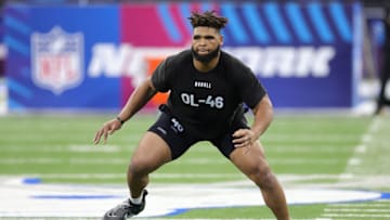INDIANAPOLIS, INDIANA - MARCH 05: O'Cyrus Torrence of Florida participates in a drill during the NFL Combine at Lucas Oil Stadium on March 05, 2023 in Indianapolis, Indiana. (Photo by Stacy Revere/Getty Images)