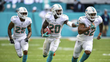 MIAMI, FL - SEPTEMBER 09: Reshad Jones #20 of the Miami Dolphins runs with an interception during the third quarter against the Tennessee Titans at Hard Rock Stadium on September 9, 2018 in Miami, Florida. (Photo by Mark Brown/Getty Images)