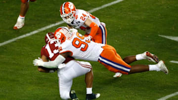 SANTA CLARA, CALIFORNIA - JANUARY 07: Clelin Ferrell #99 of the Clemson Tigers tackles Tua Tagovailoa #13 of the Alabama Crimson Tide on fourth down during the fourth quarter in the College Football Playoff National Championship at Levi's Stadium on January 07, 2019 in Santa Clara, California. (Photo by Lachlan Cunningham/Getty Images)