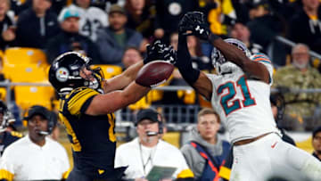 PITTSBURGH, PA - OCTOBER 28: Eric Rowe #21 of the Miami Dolphins breaks up a pass to Vance McDonald #89 of the Pittsburgh Steelers on October 28, 2019 at Heinz Field in Pittsburgh, Pennsylvania. (Photo by Justin K. Aller/Getty Images)