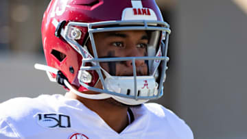 FAYETTEVILLE, AR - NOVEMBER 9: Tua Tagovailoa #13 of the Alabama Crimson Tide walks onto the field before a game against the Mississippi State Bulldogs at Davis Wade Stadium on November 16, 2019 in Starkville, Mississippi. The Crimson Tide defeated the Bulldogs 38-7. (Photo by Wesley Hitt/Getty Images)