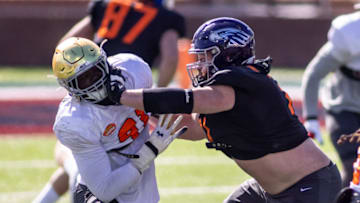 Jan 28, 2021; National defensive lineman Ade Ogundeji of Notre Dame (91) drills against National offensive lineman Quinn Meinerz of Wisconsin -Whitewater (71) during National practice at Hancock Whitney Stadium in Mobile, Alabama, USA; Mandatory Credit: Vasha Hunt-USA TODAY Sports
