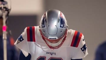 Dec 12, 2022; Glendale, Arizona, USA; New England Patriots quarterback Mac Jones (10) reacts against the Arizona Cardinals at State Farm Stadium. Mandatory Credit: Mark J. Rebilas-USA TODAY Sports