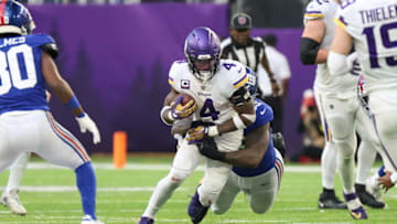 Dec 24, 2022; Minneapolis, Minnesota, USA; Minnesota Vikings running back Dalvin Cook (4) runs the ball against the New York Giants during the fourth quarter at U.S. Bank Stadium. Mandatory Credit: Matt Krohn-USA TODAY Sports