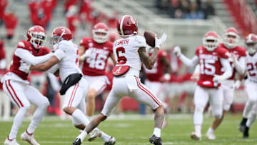 Dec 12, 2020; Fayetteville, Arkansas, USA; Alabama Crimson Tide punt returner DeVonta Smith (6) fields a punt before returning it for a touchdown against the Arkansas Razorbacks in the first quarter at Donald W. Reynolds Razorback Stadium. Mandatory Credit: Nelson Chenault-USA TODAY Sports