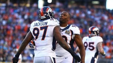 Feb 7, 2016; Santa Clara, CA, USA; Denver Broncos defensive tackle Malik Jackson (97) celebrates a first quarter defensive touchdown with defensive end Antonio Smith (90) against the Carolina Panthers in Super Bowl 50 at Levi