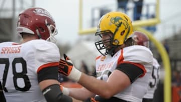 Jan 26, 2016; Mobile, AL, USA; North squad offensive tackle Joe Haeg of North Dakota State (right) works with offensive tackle Jason Spriggs of Indiana (78) on a drill during Senior Bowl practice at Ladd-Peebles Stadium. Mandatory Credit: Glenn Andrews-USA TODAY Sports