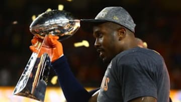 Feb 7, 2016; Santa Clara, CA, USA; Denver Broncos outside linebacker Von Miller (58) holds the Vince Lombardi Trophy after defeating the Carolina Panthers in Super Bowl 50 at Levi