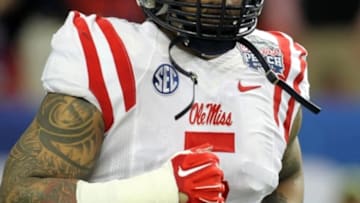 Dec 31, 2014; Atlanta , GA, USA; Mississippi Rebels defensive tackle Robert Nkemdiche (5) takes the field prior to facing the TCU Horned Frogs in the 2014 Peach Bowl at the Georgia Dome. Mandatory Credit: Brett Davis-USA TODAY Sports