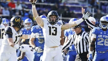 Dec 29, 2015; Fort Worth, TX, USA; California Golden Bears defensive end Kyle Kragen (13) celebrates recovering a fumble in the second quarter against the Air Force Falcons at Amon G. Carter Stadium. Mandatory Credit: Tim Heitman-USA TODAY Sports