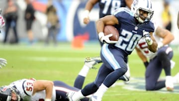 Dec 27, 2015; Nashville, TN, USA; Tennessee Titans running back Bishop Sankey (20) runs for a first down during the second half against the Houston Texans at Nissan Stadium. The Texans won 34-6. Mandatory Credit: Christopher Hanewinckel-USA TODAY Sports