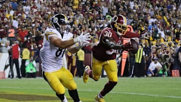 Sep 12, 2016; Landover, MD, USA; Washington Redskins safety David Bruton Jr. (30) breaks up a pass intended for Pittsburgh Steelers tight end Jesse James (81) in the end zone in the second quarter at FedEx Field. Mandatory Credit: Geoff Burke-USA TODAY Sports