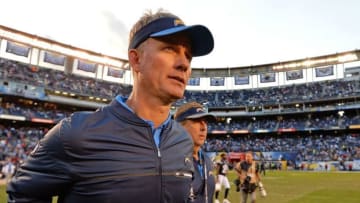 Jan 1, 2017; San Diego, CA, USA; San Diego Chargers head coach Mike McCoy runs to shake hands after a 37-27 loss to Kansas City Chiefs at Qualcomm Stadium. Mandatory Credit: Jake Roth-USA TODAY Sports