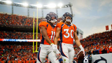 DENVER, CO - NOVEMBER 3: Running back Phillip Lindsay #30 of the Denver Broncos celebrates his touchdown with wide receiver Diontae Spencer #11 during the third quarter against the Cleveland Browns at Empower Field at Mile High on November 3, 2019 in Denver, Colorado. The Broncos defeated the Browns 24-19. (Photo by Justin Edmonds/Getty Images)