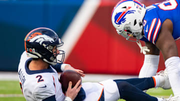 ORCHARD PARK, NY - NOVEMBER 24: Shaq Lawson #90 of the Buffalo Bills sacks Brandon Allen #2 of the Denver Broncos on a third down play during the second quarter at New Era Field on November 24, 2019 in Orchard Park, New York. (Photo by Brett Carlsen/Getty Images)