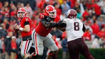 ATHENS, GEORGIA - NOVEMBER 23: Jake Fromm #11 of the Georgia Bulldogs looks to pass against the Texas A&M Aggies in the first half at Sanford Stadium on November 23, 2019 in Athens, Georgia. (Photo by Kevin C. Cox/Getty Images)