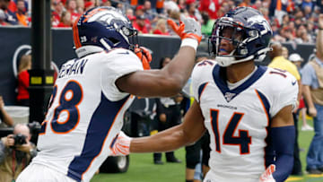 HOUSTON, TEXAS - DECEMBER 08: Royce Freeman #28 of the Denver Broncos celebrates his touchdown with teammate Courtland Sutton #14 in the second quarter against the Houston Texans at NRG Stadium on December 08, 2019 in Houston, Texas. (Photo by Bob Levey/Getty Images)