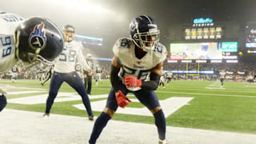FOXBOROUGH, MASSACHUSETTS - JANUARY 04: Logan Ryan #26 of the Tennessee Titans celebrates his touchdown against the New England Patriots in the AFC Wild Card Playoff game at Gillette Stadium on January 04, 2020 in Foxborough, Massachusetts. (Photo by Kathryn Riley/Getty Images)