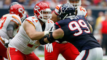 HOUSTON, TX - SEPTEMBER 18: J.J. Watt #99 of the Houston Texans is double teamed by Mitchell Schwartz #71 of the Kansas City Chiefs and Jah Reid #75 at NRG Stadium on September 18, 2016 in Houston, Texas. (Photo by Bob Levey/Getty Images)