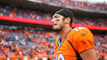 DENVER, CO - OCTOBER 9: Quarterback Paxton Lynch #12 of the Denver Broncos walks off the field after losing 23-16 to the Atlanta Falcons at Sports Authority Field at Mile High on October 9, 2016 in Denver, Colorado. (Photo by Justin Edmonds/Getty Images)