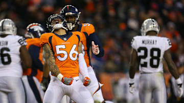 DENVER, CO - JANUARY 1: Outside linebacker Shane Ray #56 of the Denver Broncos and outside linebacker Von Miller #58 celebrate a strip fumble in the fourth quarter of the game against the Oakland Raiders at Sports Authority Field at Mile High on January 1, 2017 in Denver, Colorado. (Photo by Justin Edmonds/Getty Images)